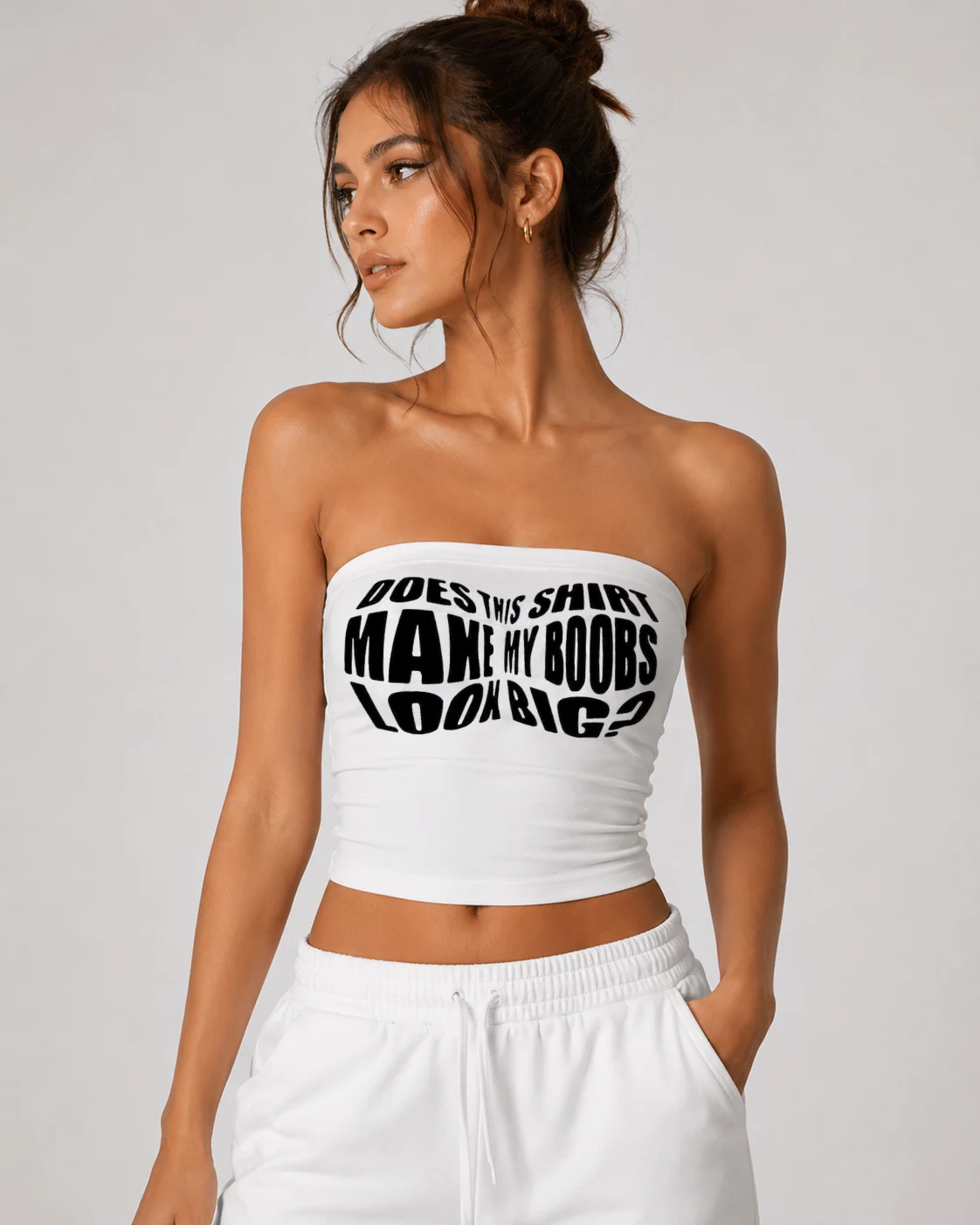 Model in a white tube top with warped heavy display type across the front