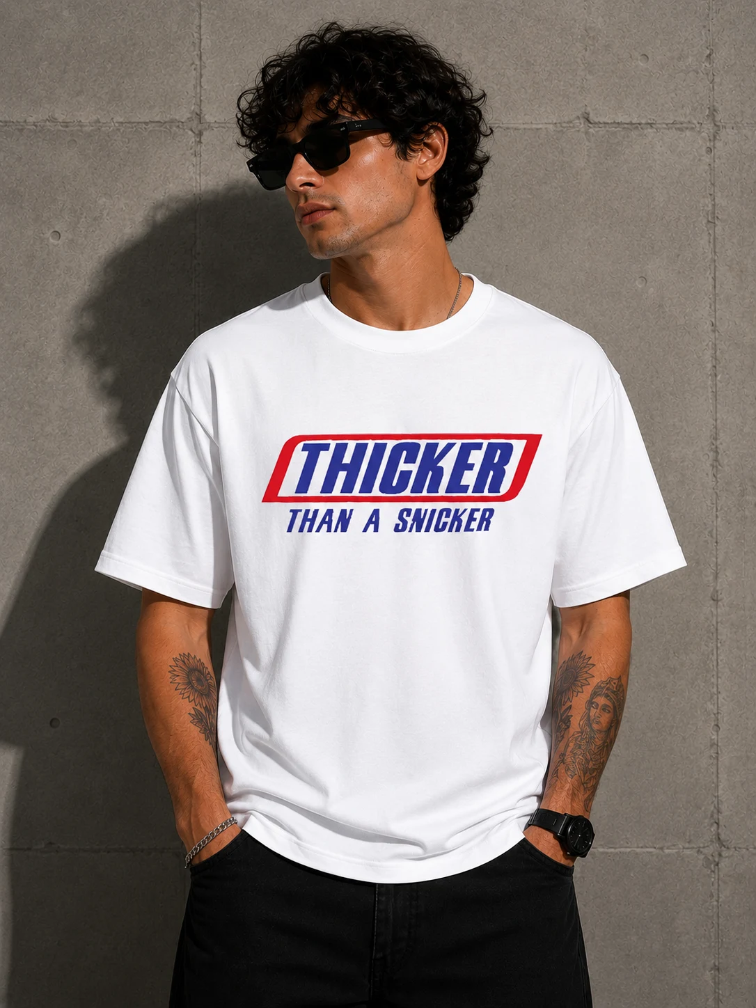 Model in a white tee with a bold red and blue bar logo print